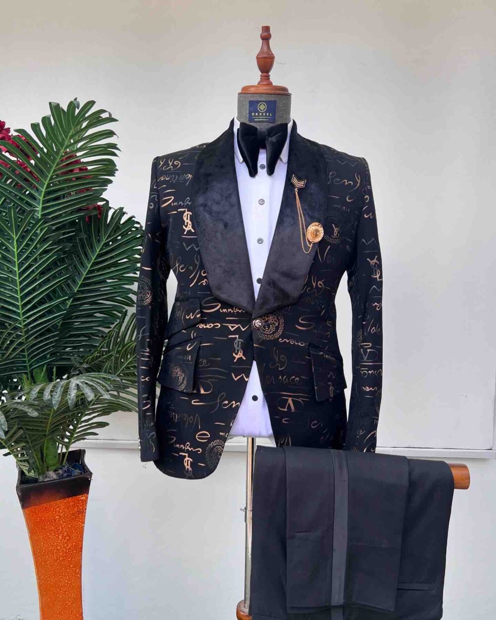 golden inscribed black jacquard tuxedo suit