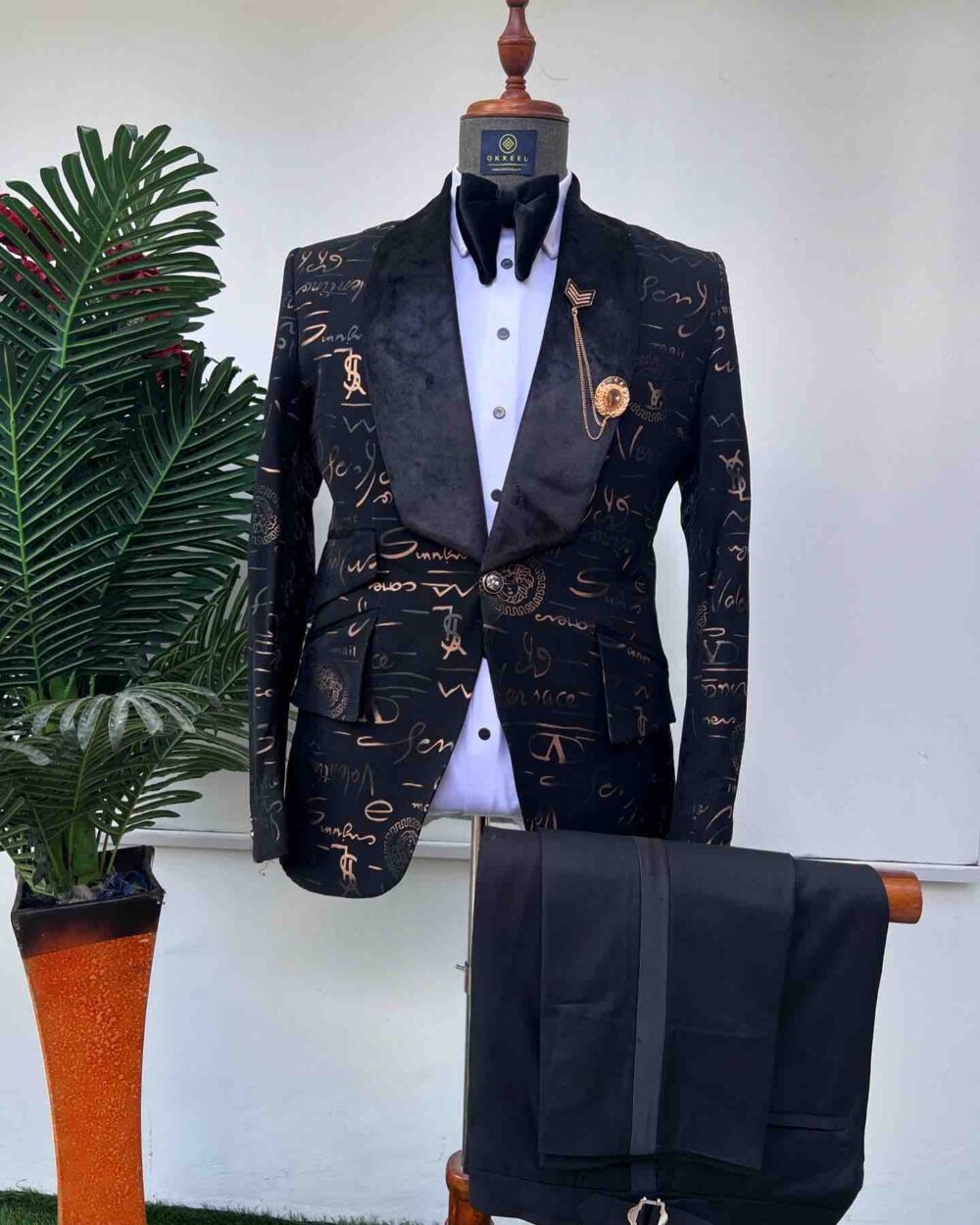 golden inscribed black jacquard tuxedo suit