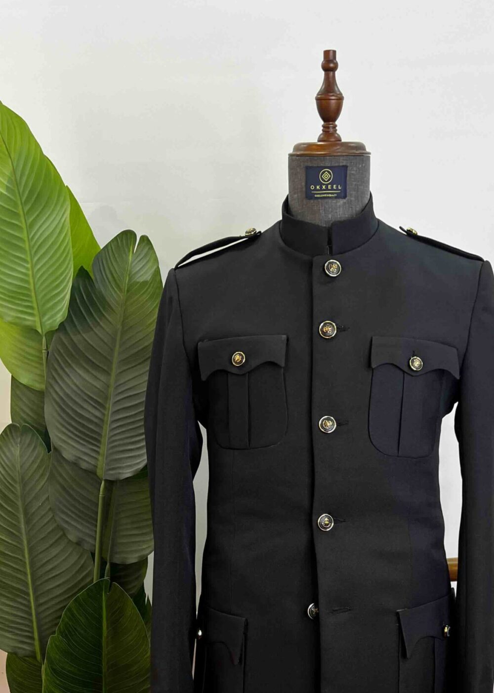 Black four button French safari suit