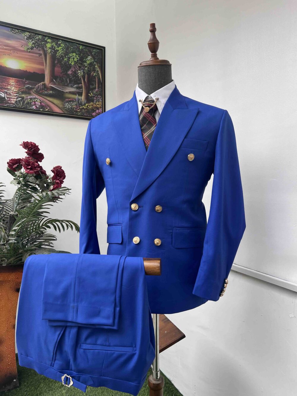 Royal blue double breasted peak lapel suit