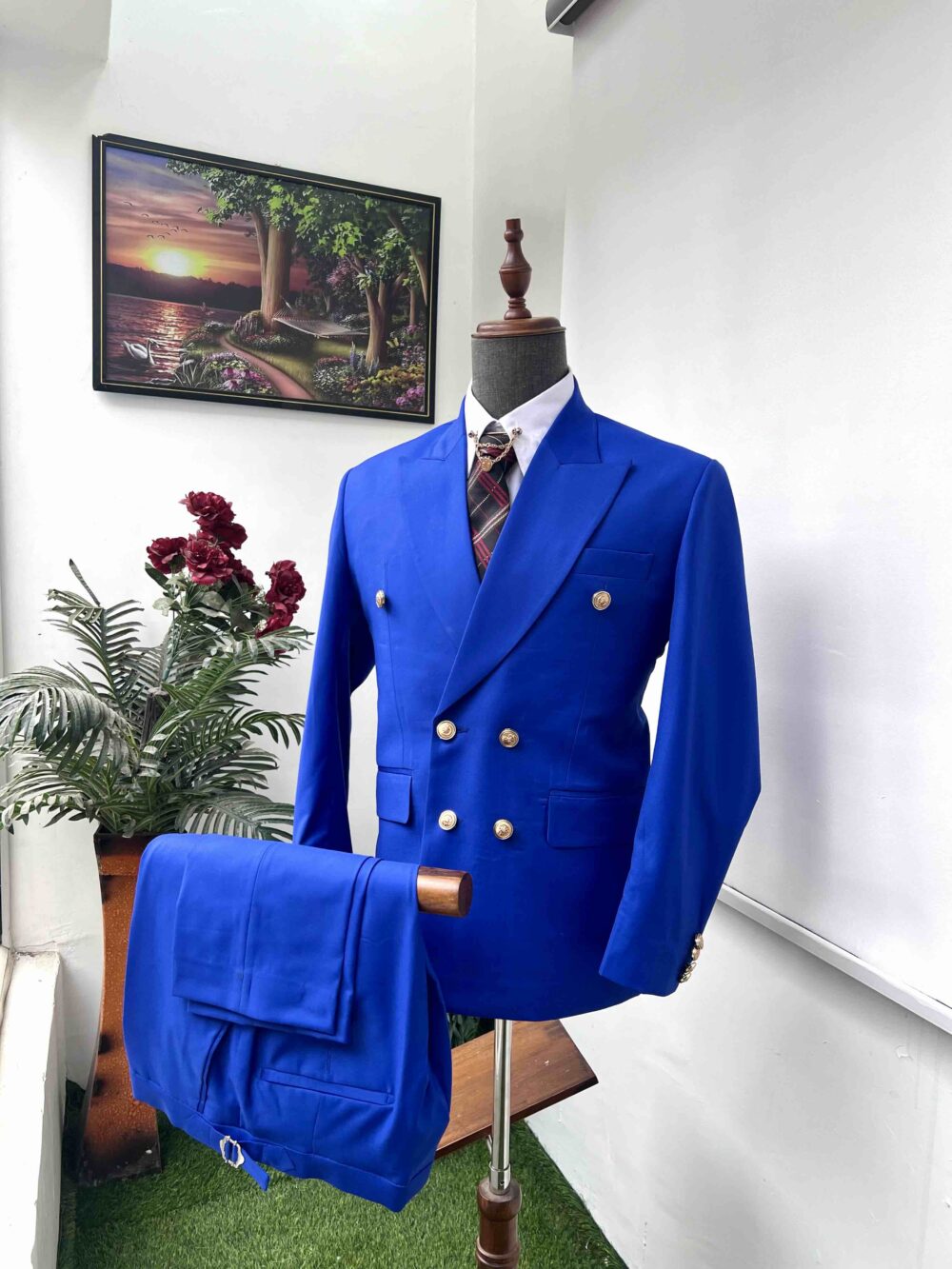 Royal blue double breasted peak lapel suit