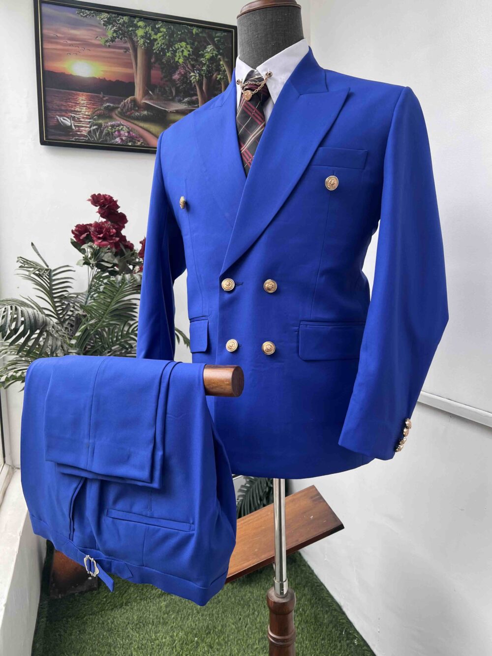 Royal blue double breasted peak lapel suit